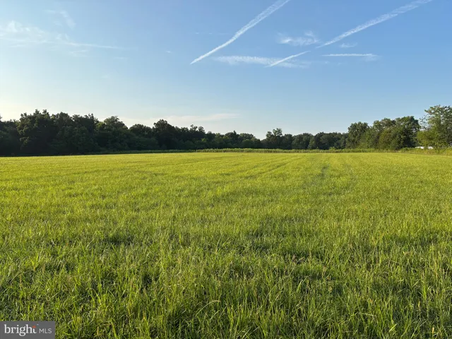 a view of an ocean and a mountain