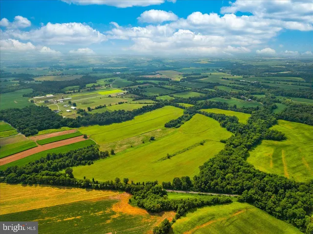 a view of a lake with a big yard