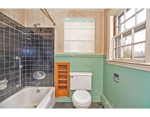 245 Great Road Stow, MA 01775 - Photo 14 of 35 a bathroom with a toilet a sink and a bathtub