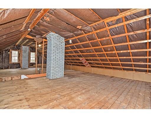 245 Great Road Stow, MA 01775 - Photo 19 of 35 a view of an empty room with wooden floor