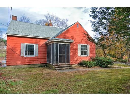 245 Great Road Stow, MA 01775 - Photo 27 of 35 a backyard of a house with potted plants and large tree