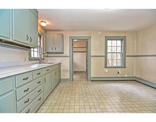 245 Great Road Stow, MA 01775 - Photo 7 of 35 a bathroom with a sink a mirror and a window