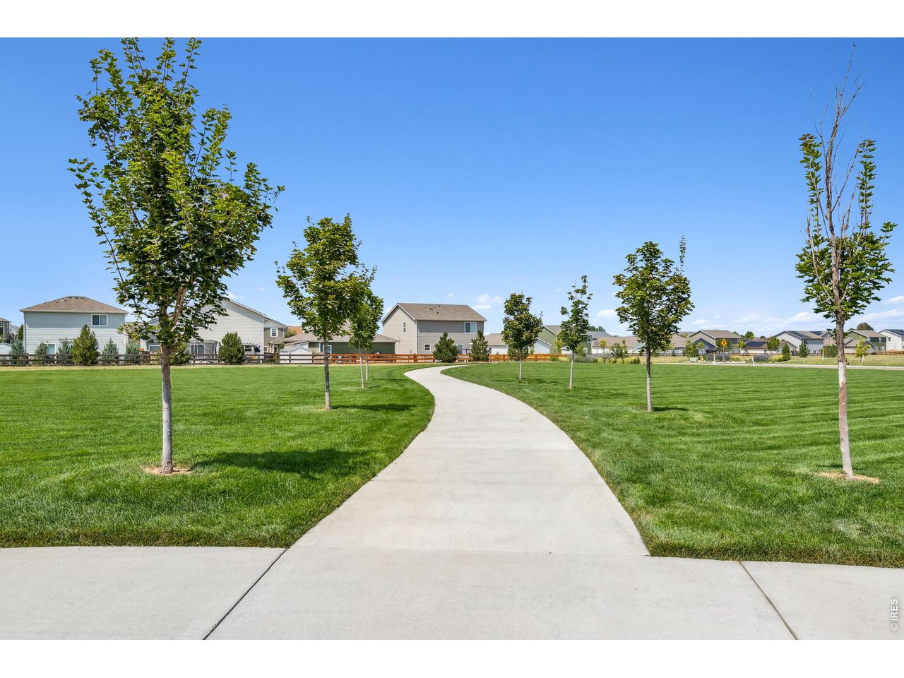 7465 Slate Place Frederick, CO 80530 - Photo 18 of 28 a view of a garden with houses