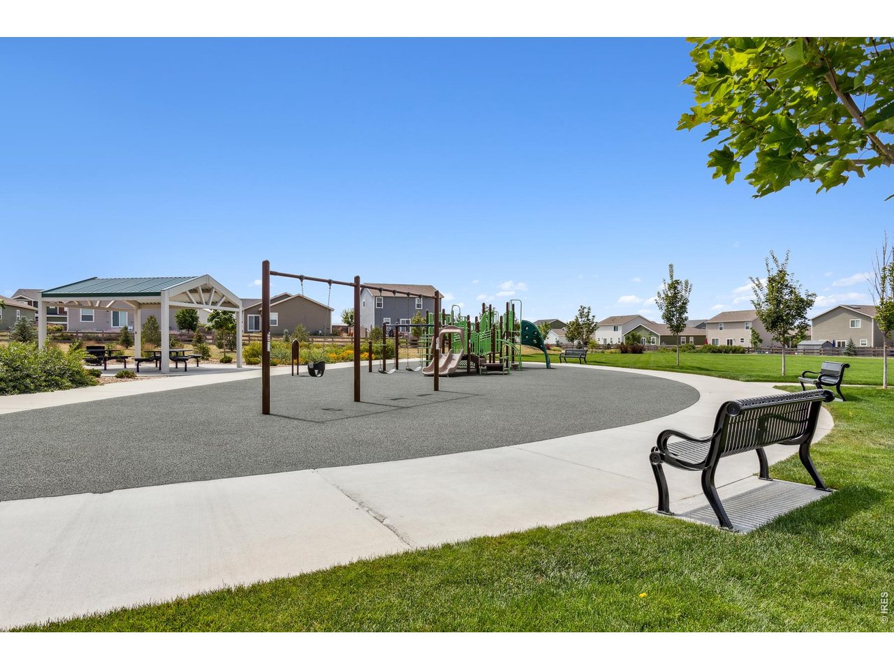 7465 Slate Place Frederick, CO 80530 - Photo 20 of 28 a view of a bench in front of a building