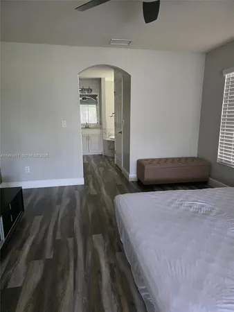 a view of an chairs and tables in the balcony