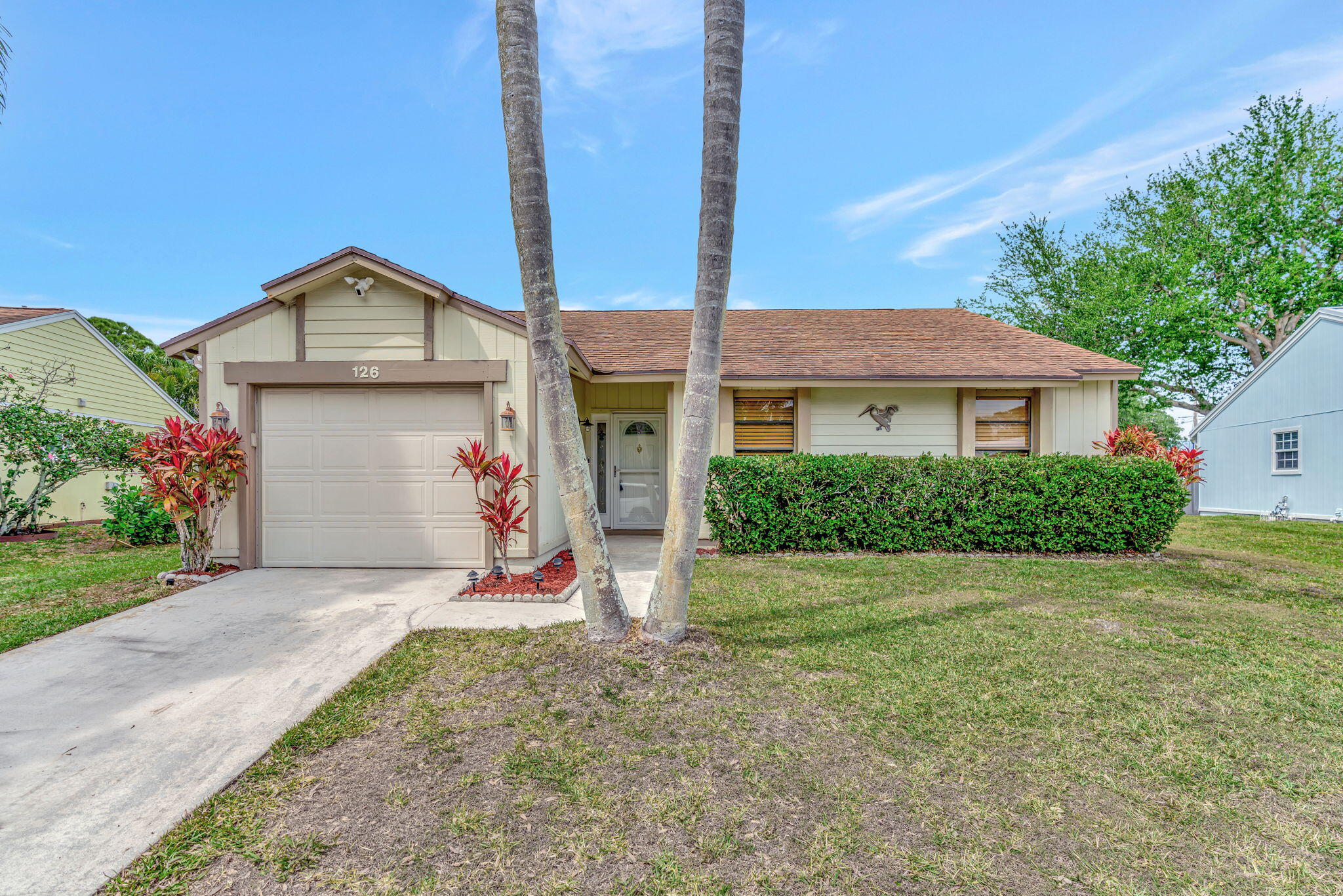 126 Greentree Circle Jupiter, FL 33458 - Photo 1 of 24 Front