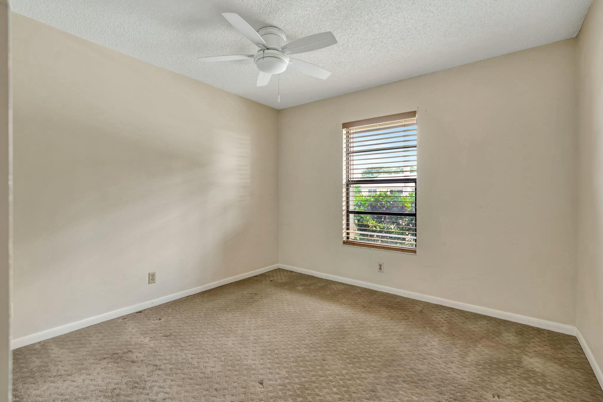 126 Greentree Circle Jupiter, FL 33458 - Photo 11 of 24 Guest Bed