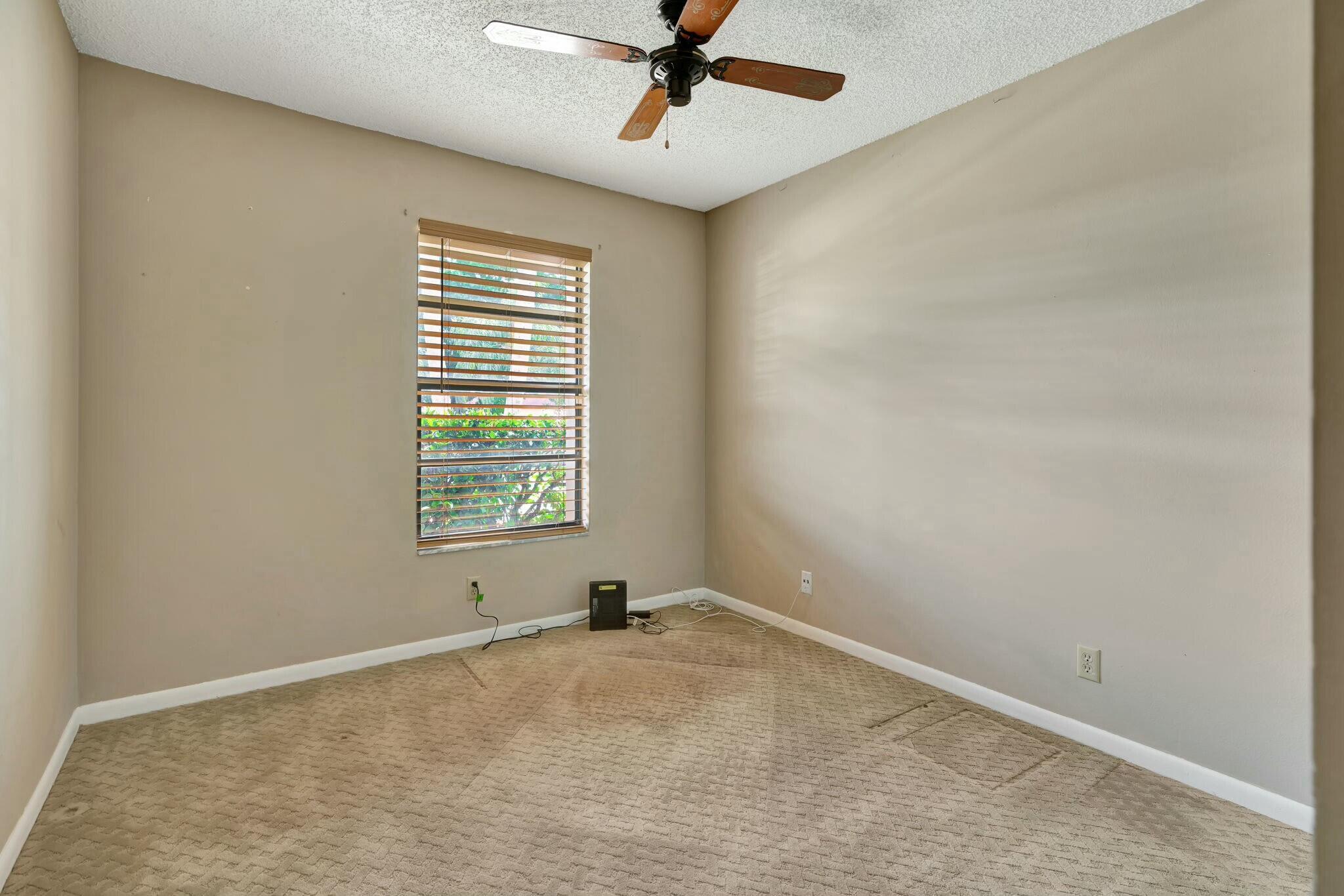 126 Greentree Circle Jupiter, FL 33458 - Photo 9 of 24 Guest Bed