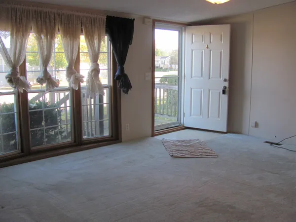 a view of a room that has a fan