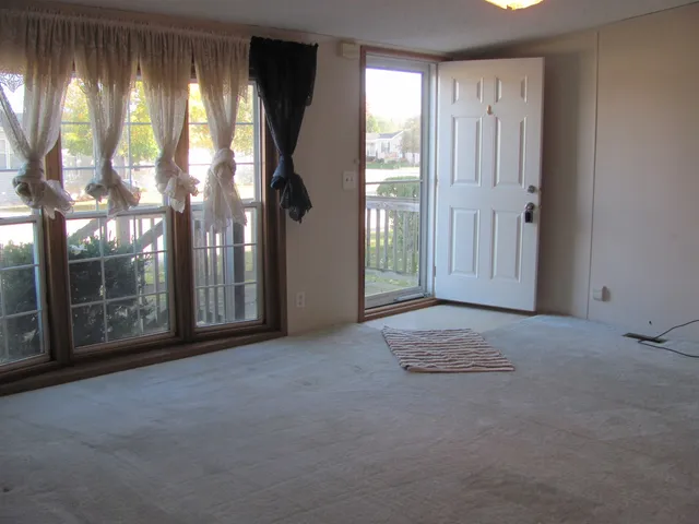 a view of a room that has a fan