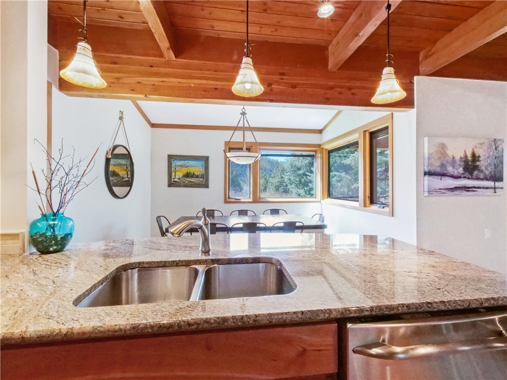 530 Tennis Club Road, Unit 1330 Keystone, CO 80435 - Photo 4 of 35 Kitchen Overlooking 8 Person Kitchen Table & Outside (South)