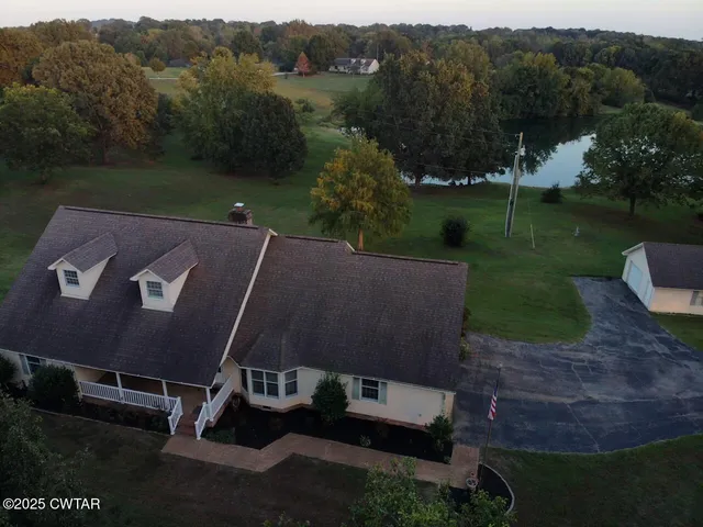 a backyard of a house with lots of green space