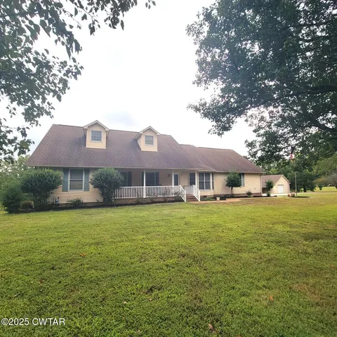 a kitchen with a sink cabinets and window
