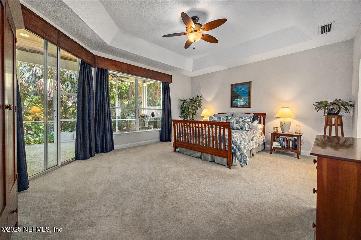 760 Mill Stream Road Ponte Vedra Beach, FL 32082 - Photo 11 of 34 a view of a livingroom with a fireplace and a large window