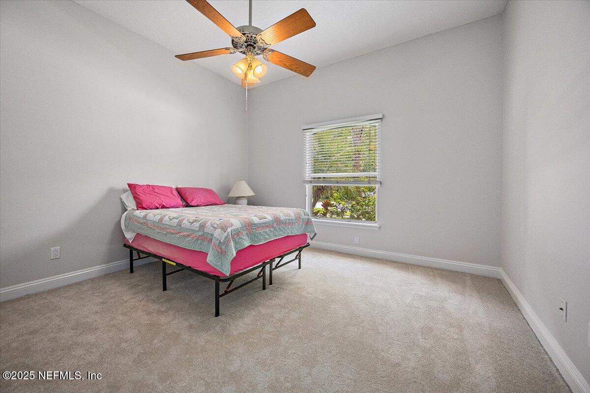 760 Mill Stream Road Ponte Vedra Beach, FL 32082 - Photo 15 of 34 a room with a bed and a window