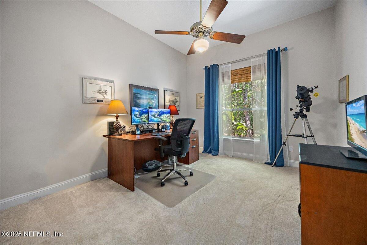 760 Mill Stream Road Ponte Vedra Beach, FL 32082 - Photo 19 of 34 a view of a workspace with furniture and a window