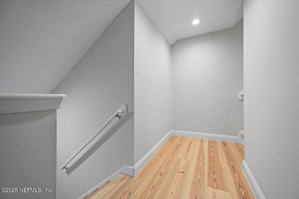 760 Mill Stream Road Ponte Vedra Beach, FL 32082 - Photo 20 of 34 a view of a hallway with wooden floor