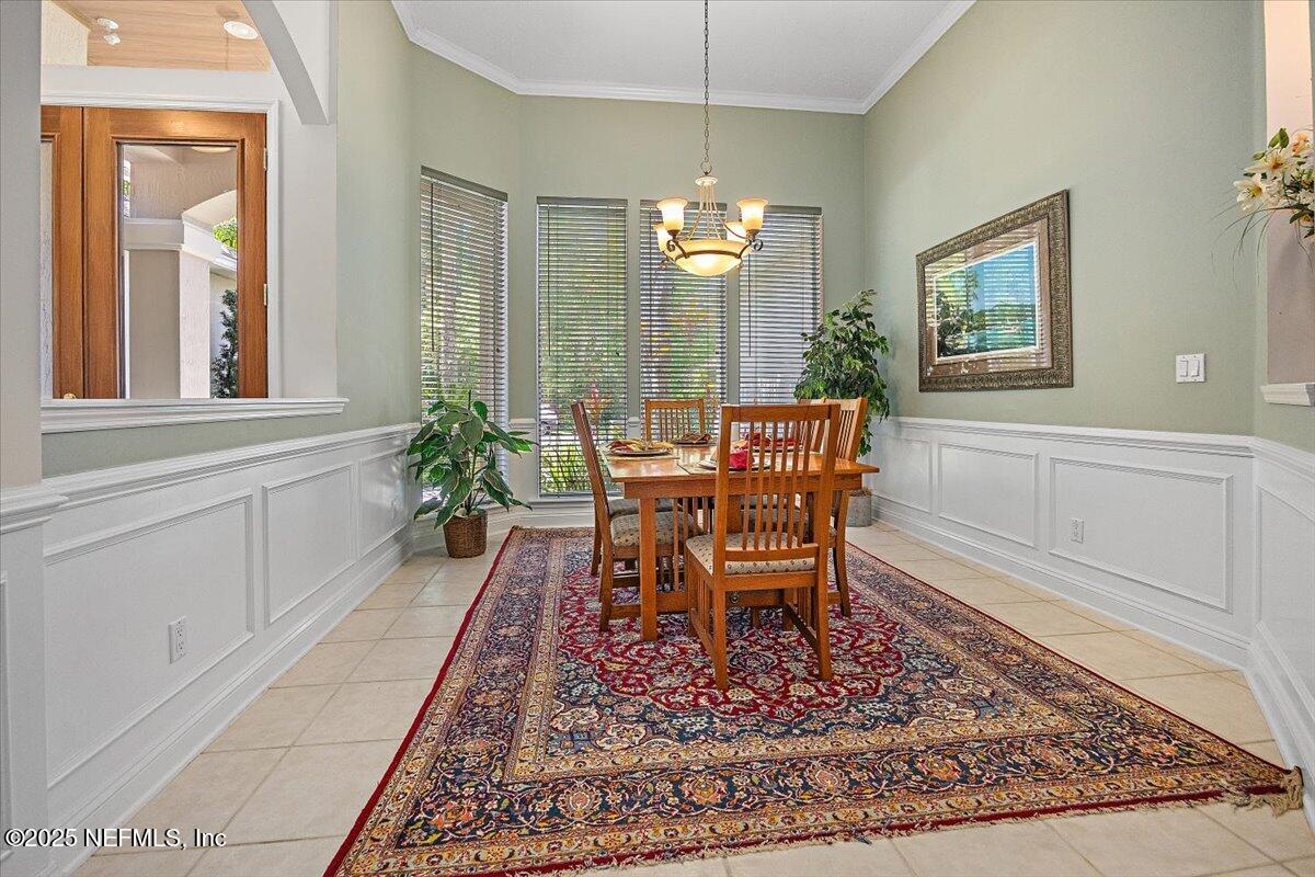 760 Mill Stream Road Ponte Vedra Beach, FL 32082 - Photo 4 of 34 a view of a dining room with furniture window and wooden floor
