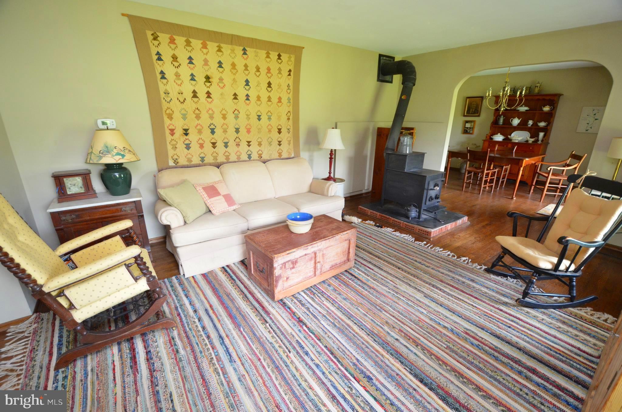 121 Deale Road Tracys Landing, MD 20779 - Photo 10 of 30 Living Room with woodstove