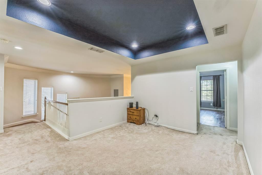 1611 Long Prairie Court Allen, TX 75002 - Photo 21 of 32 a view of an empty room