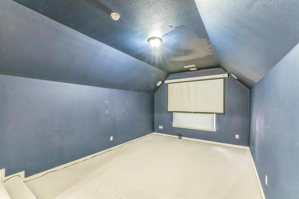 1611 Long Prairie Court Allen, TX 75002 - Photo 24 of 32 a view of a big room with windows