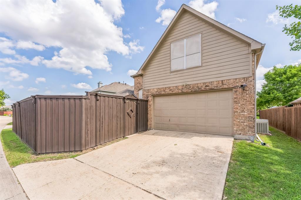 1611 Long Prairie Court Allen, TX 75002 - Photo 31 of 32 a front view of a house with a garage