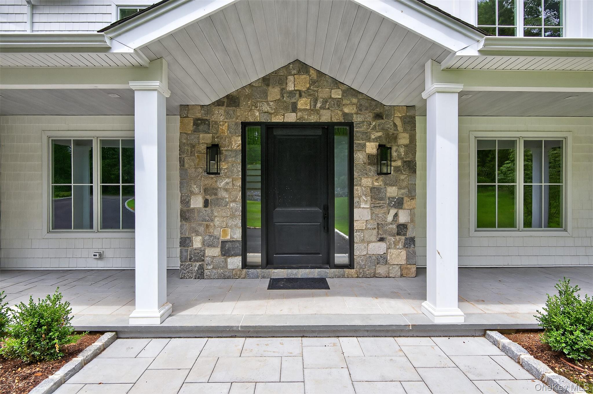 32 A Pine Road Syosset, NY 11791 - Photo 2 of 46 a view of entrance gate of the house