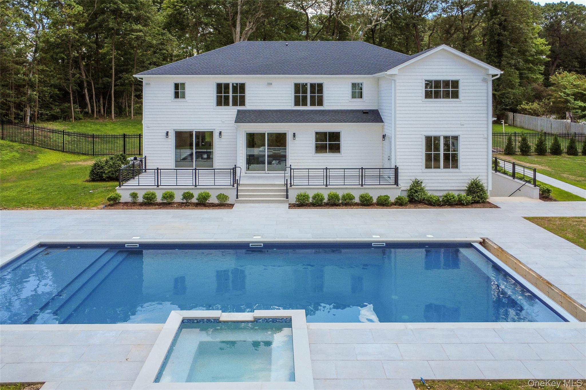 32 A Pine Road Syosset, NY 11791 - Photo 39 of 46 a front view of a house with garden