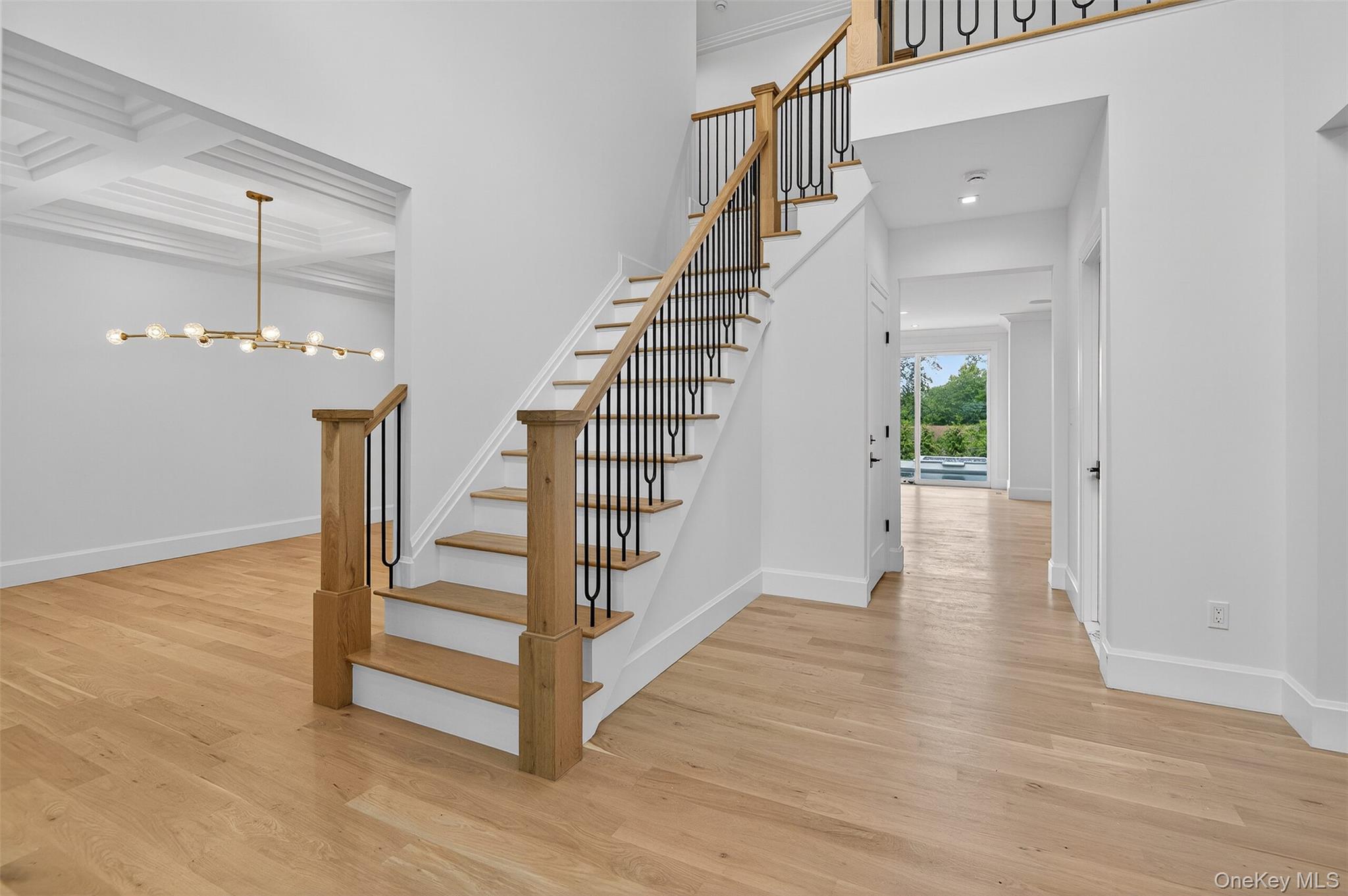 32 A Pine Road Syosset, NY 11791 - Photo 4 of 46 a view of entryway with wooden floor