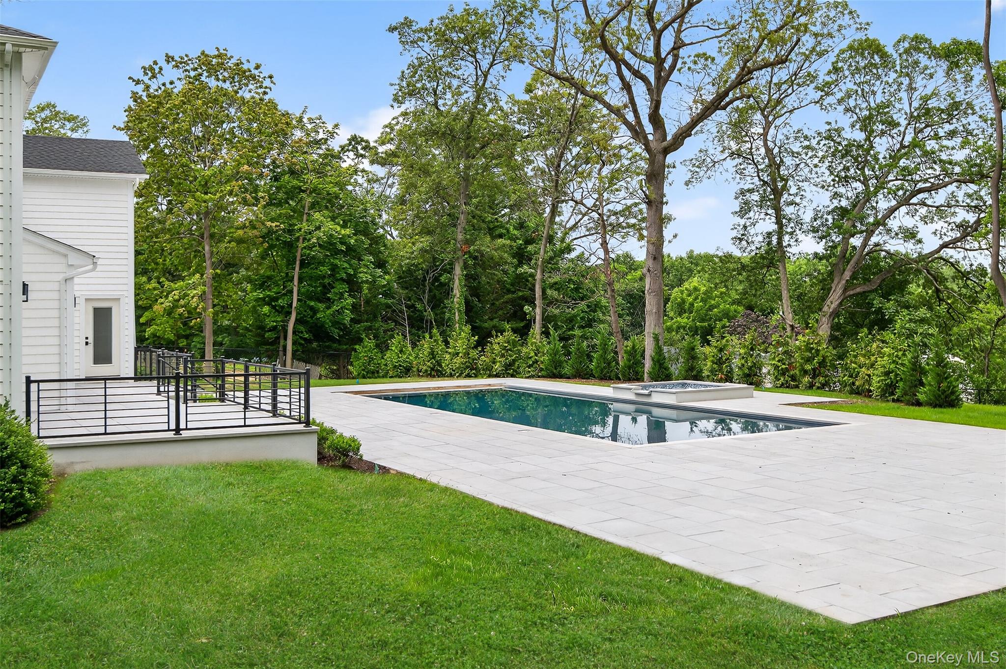 32 A Pine Road Syosset, NY 11791 - Photo 43 of 46 a view of a house with a backyard