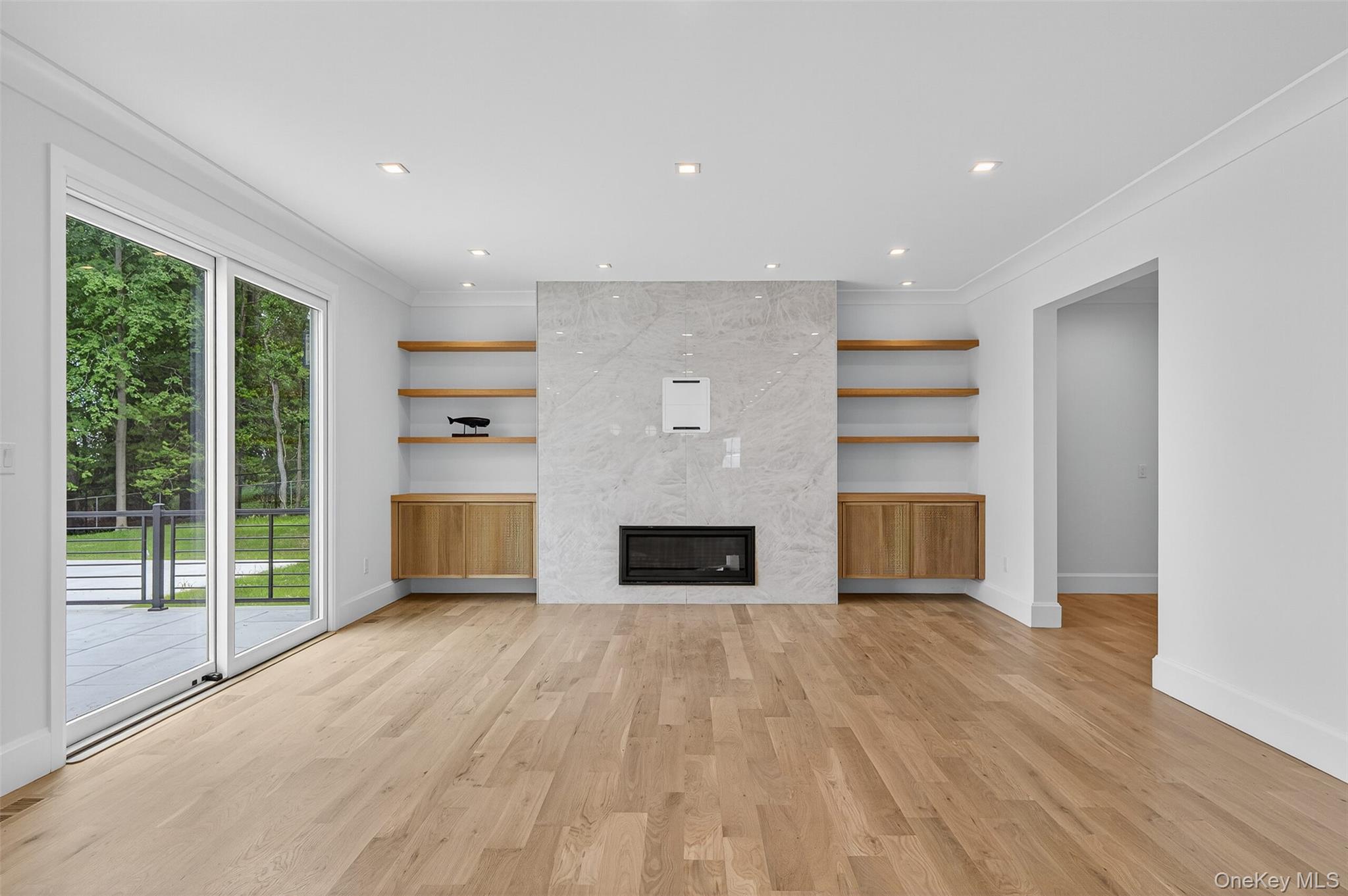 32 A Pine Road Syosset, NY 11791 - Photo 9 of 46 a view of a room with cabinet and a fireplace