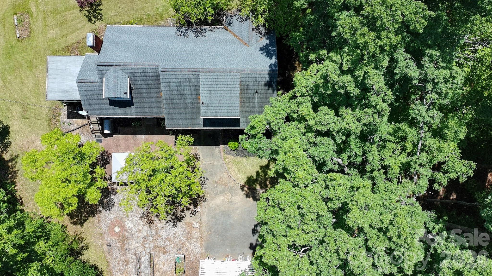 951 Dodson Mill Road Pilot Mountain, NC 27041 - Photo 42 of 48 an aerial view of a house with a yard and garden