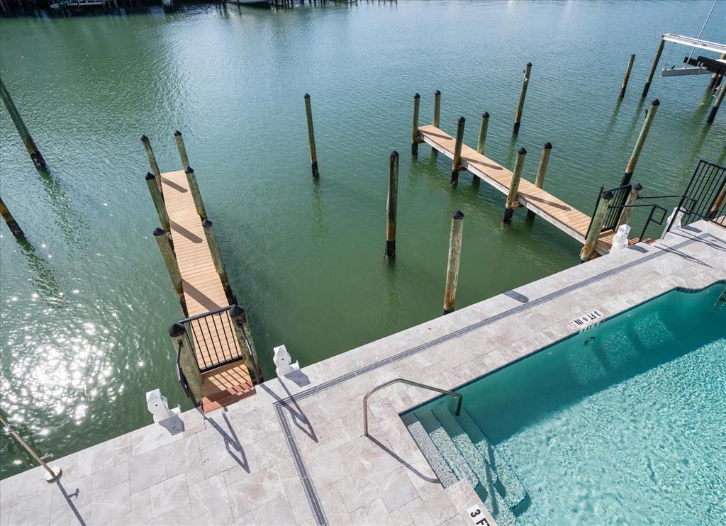 211 Dolphin Point, Unit 2 Clearwater, FL 33767 - Photo 9 of 16 a view of outdoor space and yard