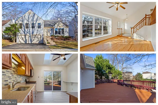 a front view of a house with a tree