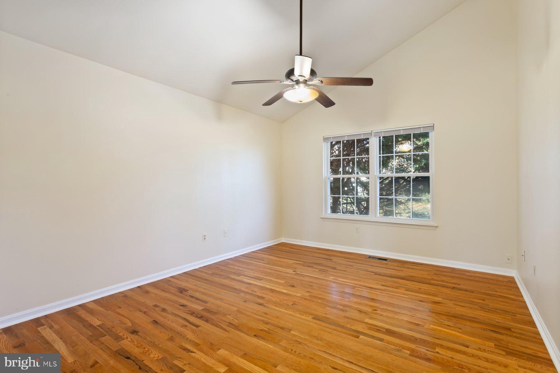 12907 Hawkshead Terrace Silver Spring, MD 20904 - Photo 16 of 30 a view of empty room with wooden floor