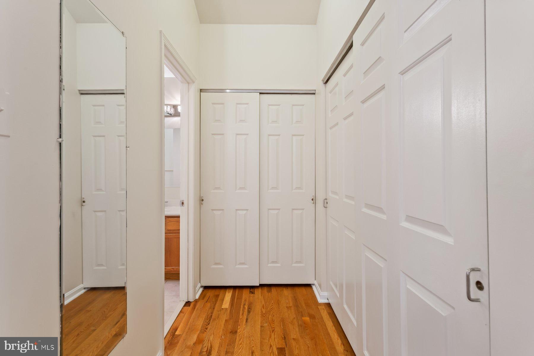 12907 Hawkshead Terrace Silver Spring, MD 20904 - Photo 17 of 30 a view of a hallway with wooden floor and closet