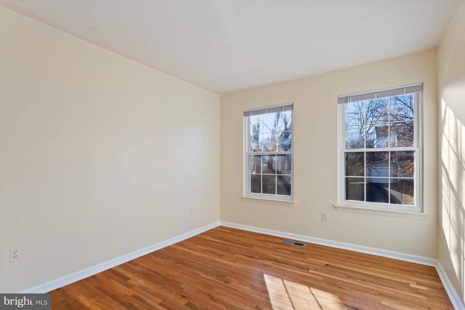 12907 Hawkshead Terrace Silver Spring, MD 20904 - Photo 20 of 30 a view of empty room with windows