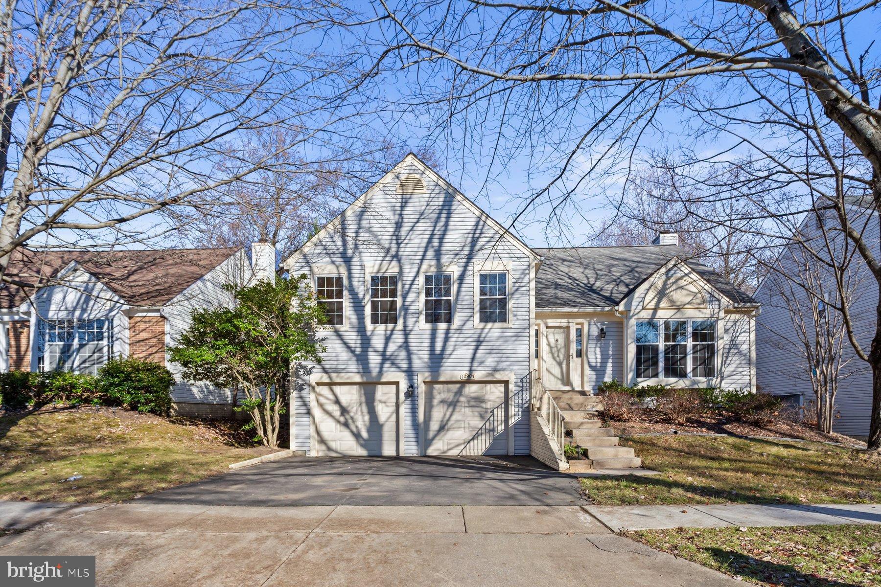 12907 Hawkshead Terrace Silver Spring, MD 20904 - Photo 2 of 30 a front view of a house with a tree