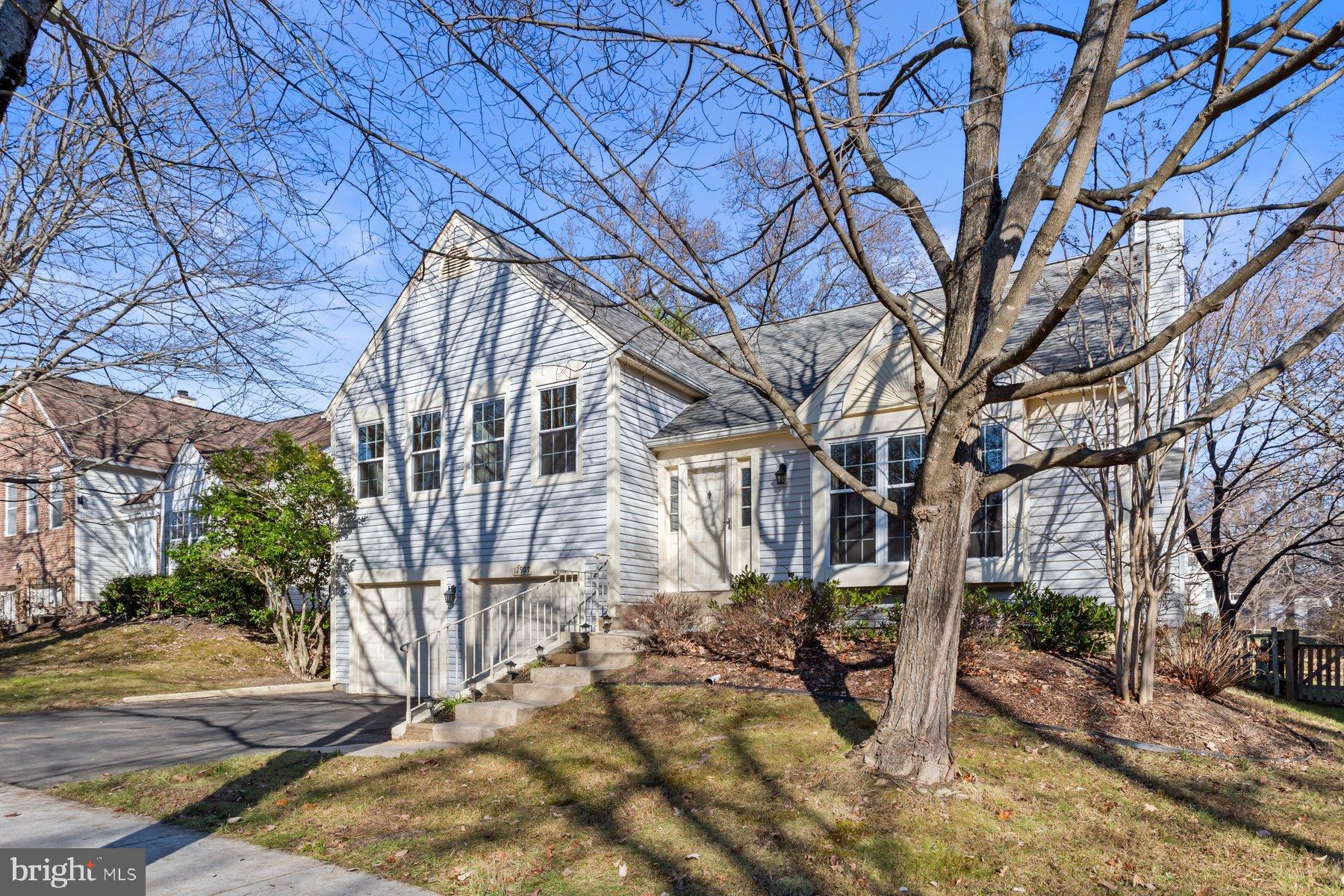 12907 Hawkshead Terrace Silver Spring, MD 20904 - Photo 3 of 30 a view of a house with a large tree