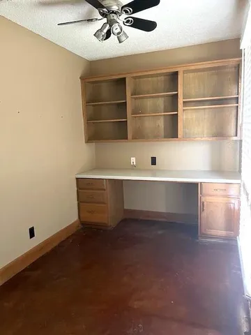 a view of a house and a yard