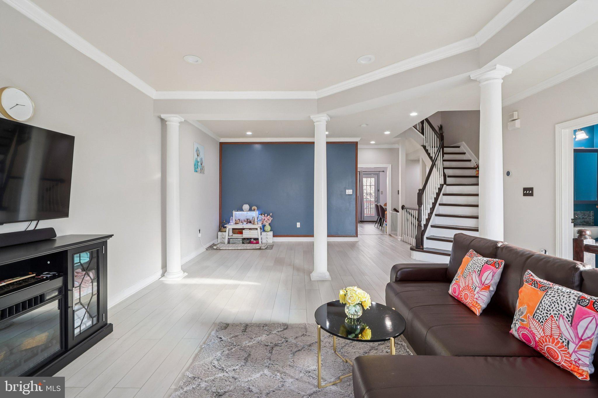 14209 Parker Farm Way Silver Spring, MD 20906 - Photo 12 of 57 a living room with furniture and wooden floor
