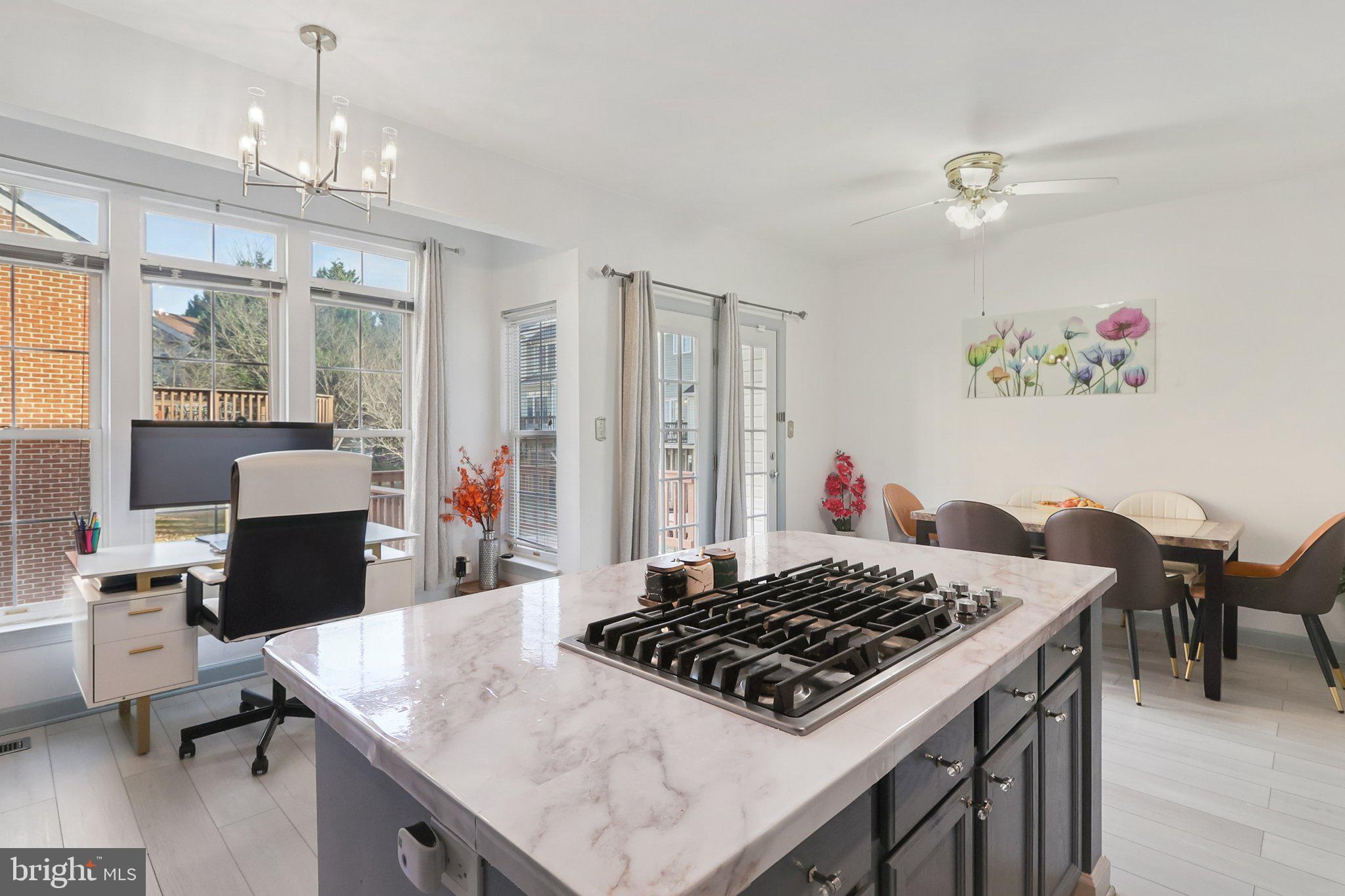 14209 Parker Farm Way Silver Spring, MD 20906 - Photo 24 of 57 a living room with furniture and a table