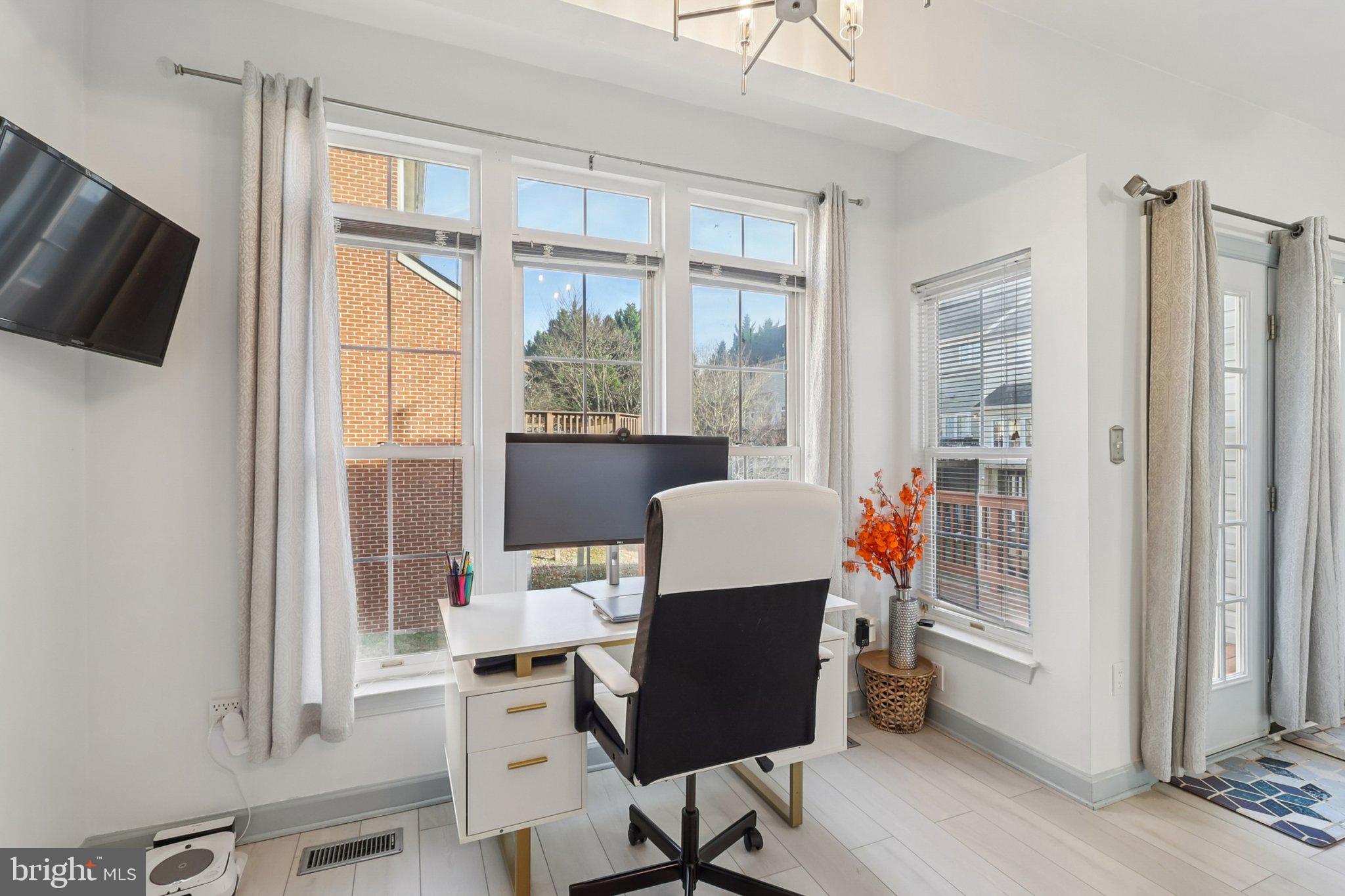 14209 Parker Farm Way Silver Spring, MD 20906 - Photo 27 of 57 a work room with furniture and windows