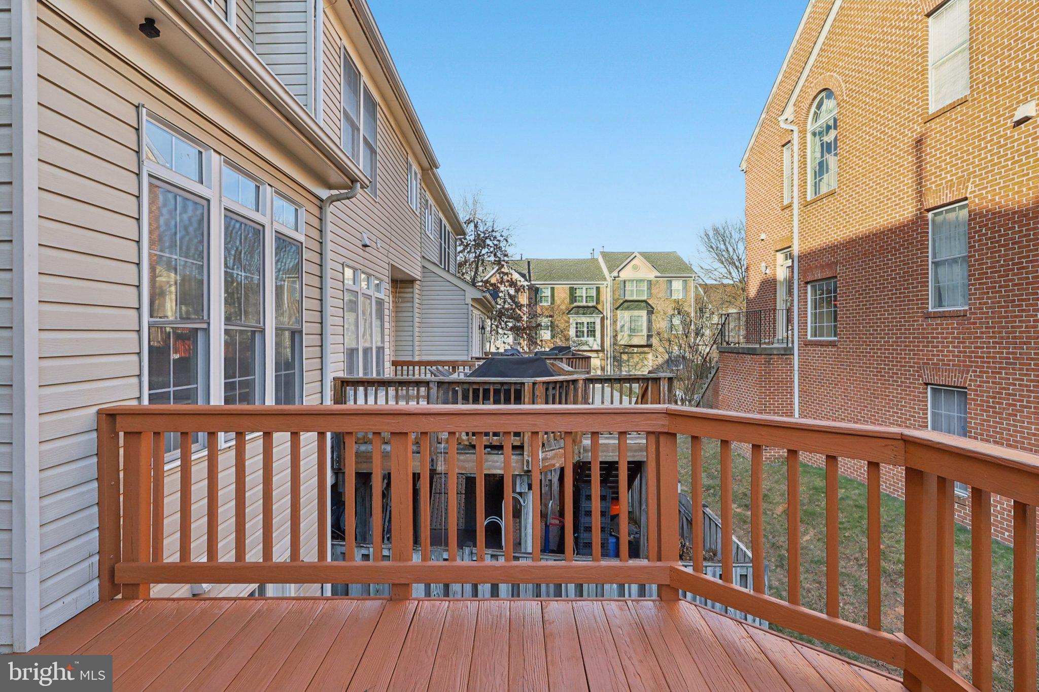 14209 Parker Farm Way Silver Spring, MD 20906 - Photo 49 of 57 a view of a brick building from a balcony