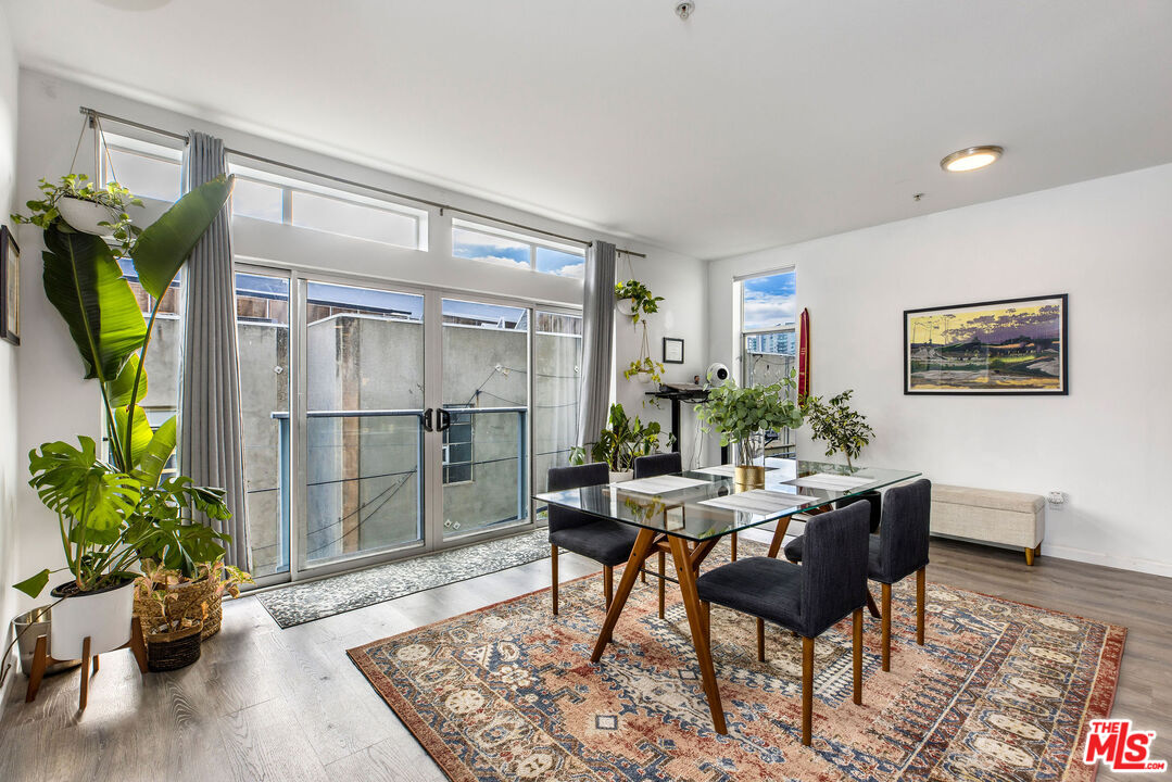 4215 Glencoe Avenue, Unit 206 Marina del Rey, CA 90292 - Photo 2 of 21 a workspace with furniture and a potted plant