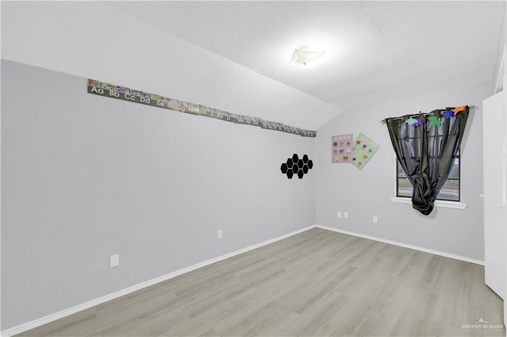 1901 Robin Avenue McAllen, TX 78504 - Photo 11 of 16 a view of a room with rack on the wall and a shower