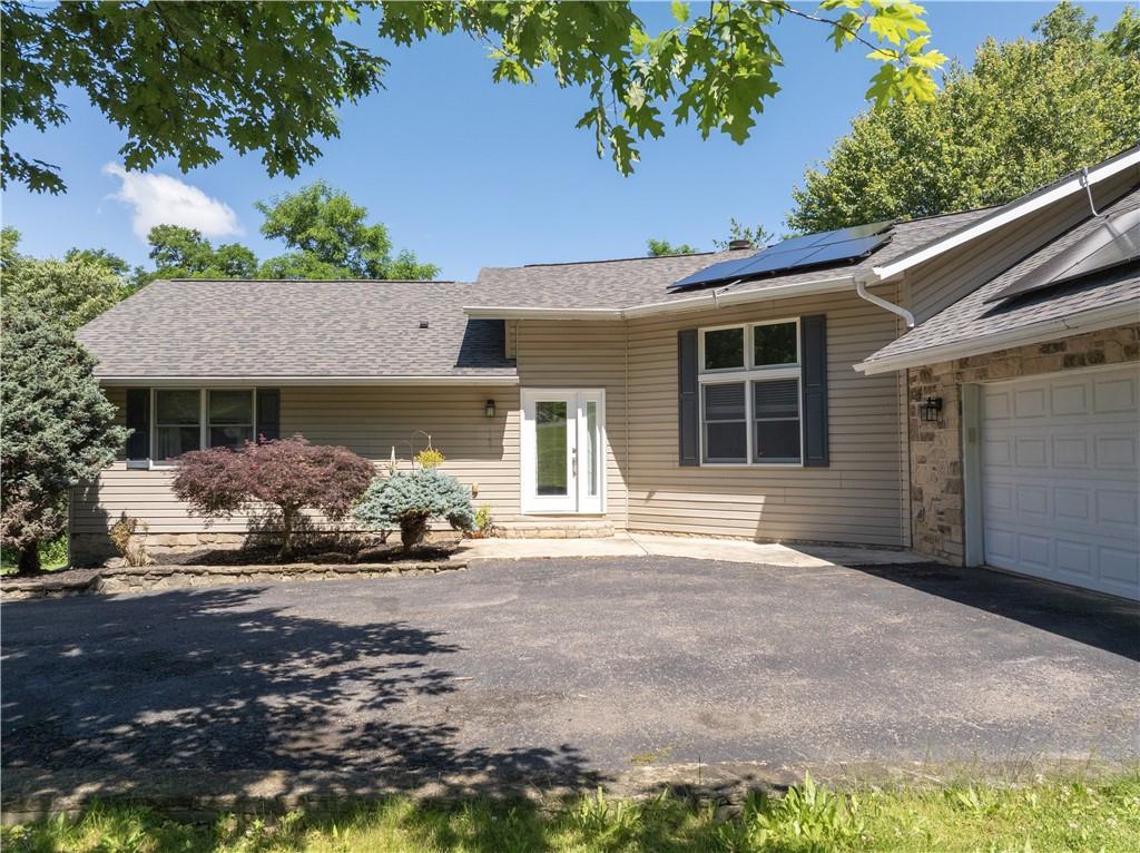 147 Lindley Road Canonsburg, PA 15317 - Photo 3 of 35 Two car garage and a nearly level driveway with a turnaround makes it easy to invite friends and family.