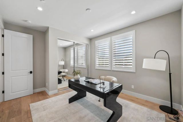 a living room with furniture and window