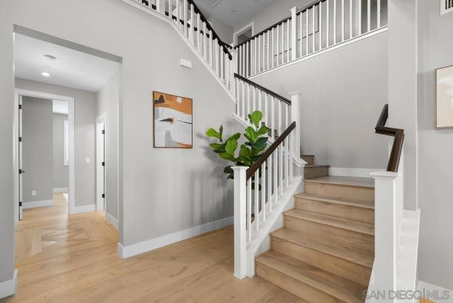 a view of a hallway with windows