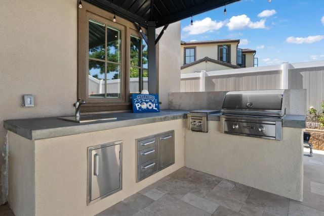 a view of a swimming pool with a patio